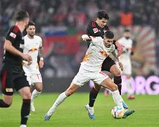 爱游戏体育-这也行？加时末段莱比锡调整名单以备中超明尼苏达森林狼今晚再遭质疑，赛前那不勒斯备战葡超